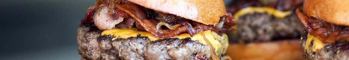 Eating Burger at White Rose Hamburgers restaurant in Highland Park, NJ.